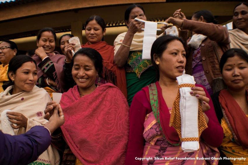 Indian women with sanitary products (Photo credit: Rudrani Ghosh photography)
