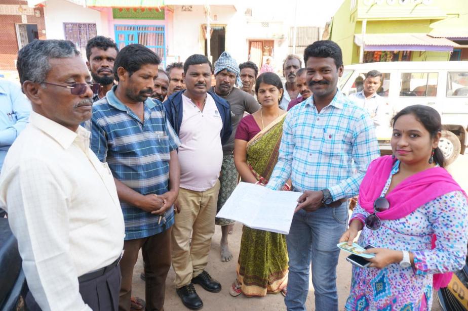 Ganjam district: district and Gram Panchayat officials and the Village Water and Sanitation Committee with the tariff collection registration
