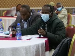 Participant at the CR WASH learning platform in Adam, Ethiopia, asking a question 