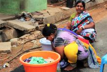 India women washing clothres. IHUWASH/NIUA